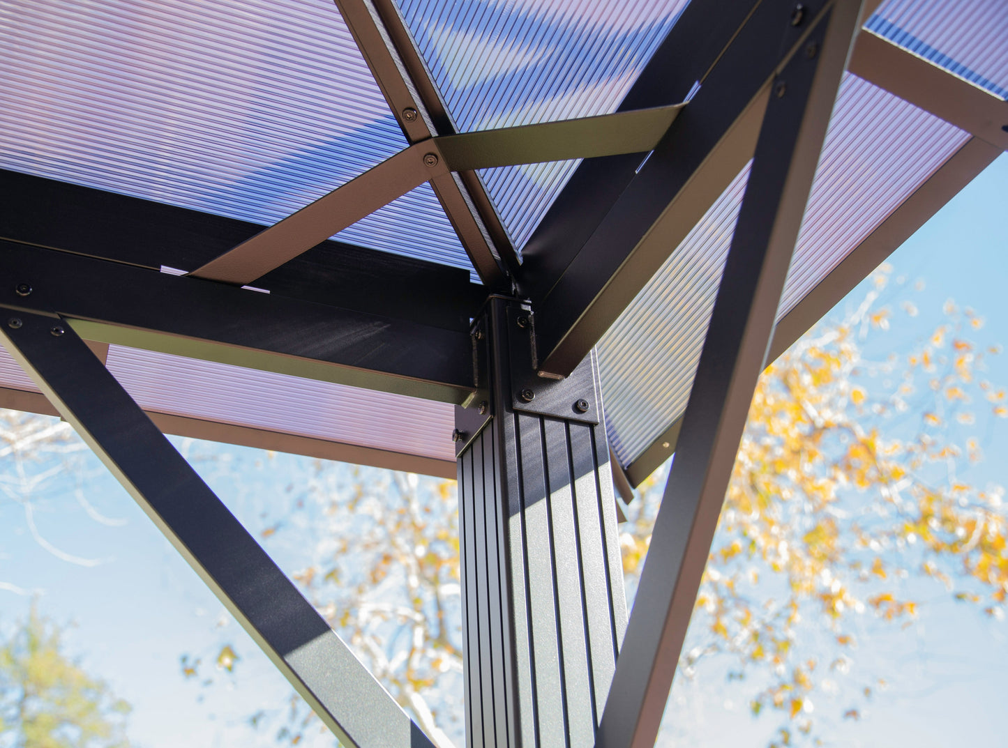 Close up of the underside of the Madrid Hard Top Gazebo transparent roof.